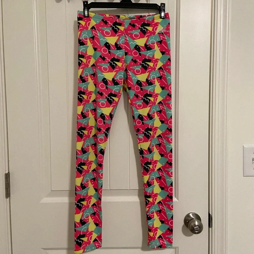 EUC | Dolfin girl’s Uglies patterned drag swim pants —‎ large